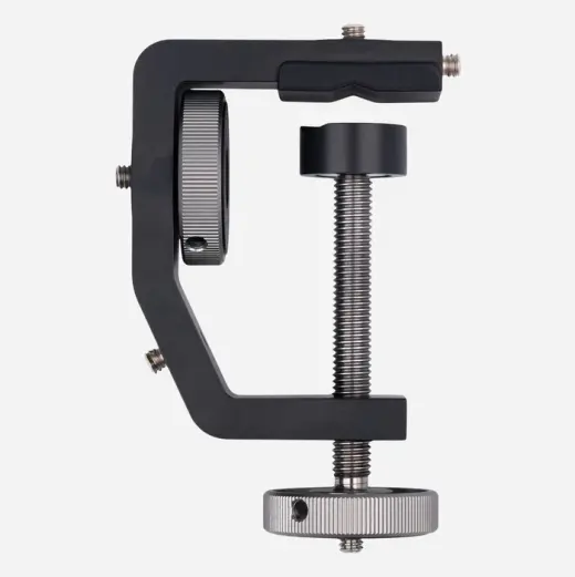 Univerzální držák pro hlavice Davros a příslušenství. Stabilní opora pro zbraň či optiku v terénu. 5 montážních bodů 1/4"-20 UNC, redukce 3/8"-16 UNC, max. rozevření 60 mm, hmotnost 270 g.